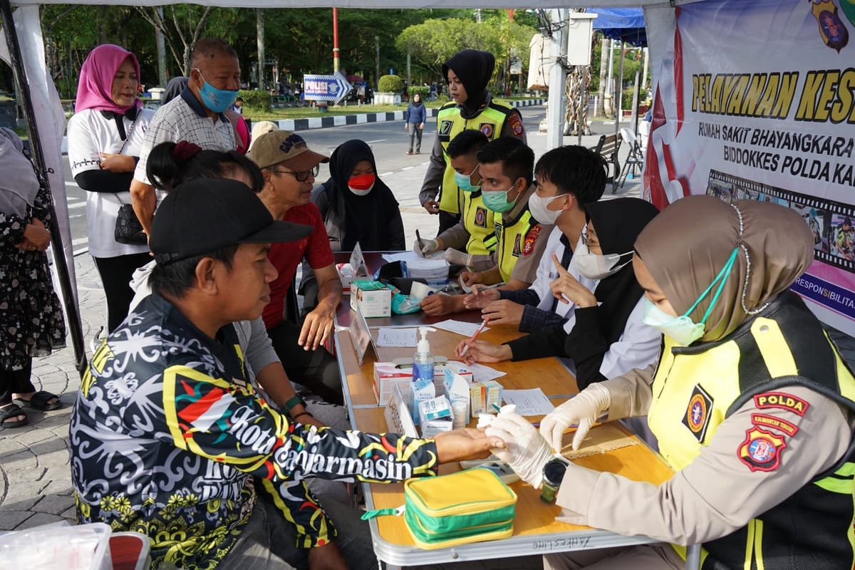 Rumkit Bhayangkara Polda Kalteng Gelar Pemeriksaan Kesehatan Gratis di CFD Palangka Raya