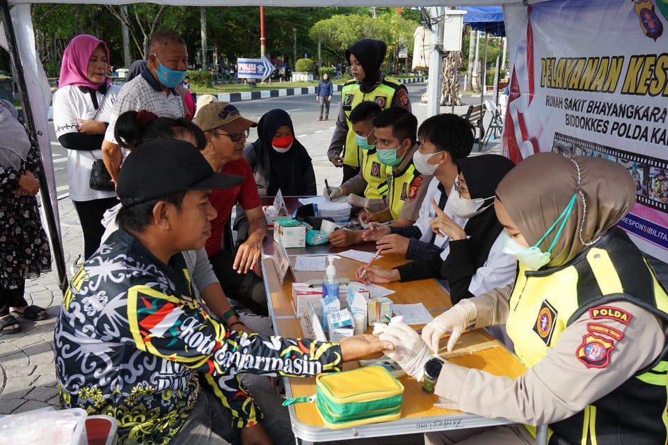 Rumkit Bhayangkara Polda Kalteng Gelar Pemeriksaan Kesehatan Gratis di CFD Palangka Raya