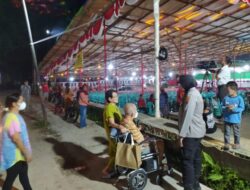 Polwan Polres Melawi Kalbar Tak Canggung Menyapa Masyarakat di Perayaan Imlek