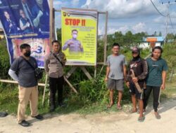 Polsek Boyan Tanjung Memasang Baliho Larangan PETI