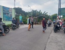 Polsek Wonosalam Laksanakan Pengaturan Dan Pantau Lalu Lintas Jalan