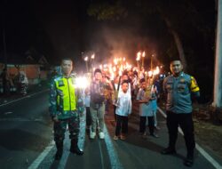 Sinergitas TNI -POLRI Lakukan Pengamanan Jalur Pawai Obor Dalam Rangka Tahun Baru Islam