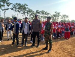 Partisipasi Bhabinkamtibmas Desa Gunungwungkal dalam Acara Senam Bersama Siswa Paud