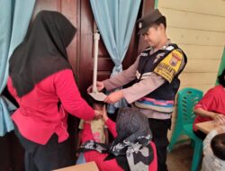 Bersama Tim Kesehatan Desa Regaloh, Bhabinkamtibmas Polsek Tlogowungu Laksanakan Posyandu